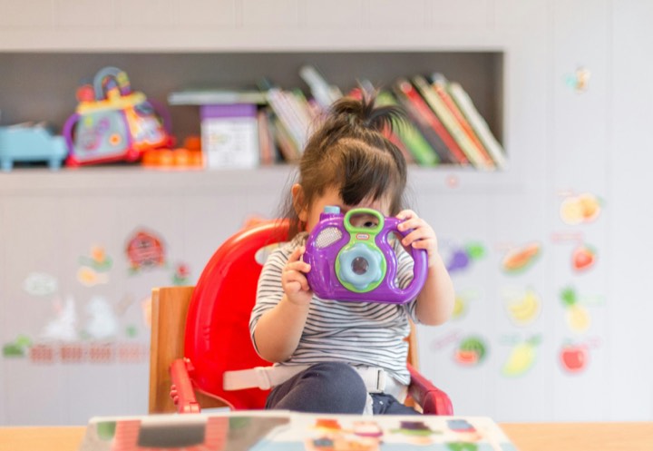 Toddler with her first camera