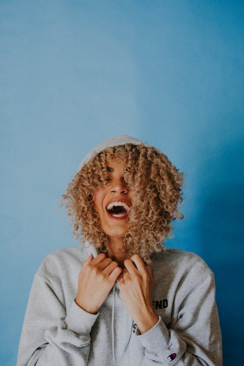 Portrait, mid-laugh